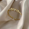 Golden Pavé Charm Cuff Bracelet
