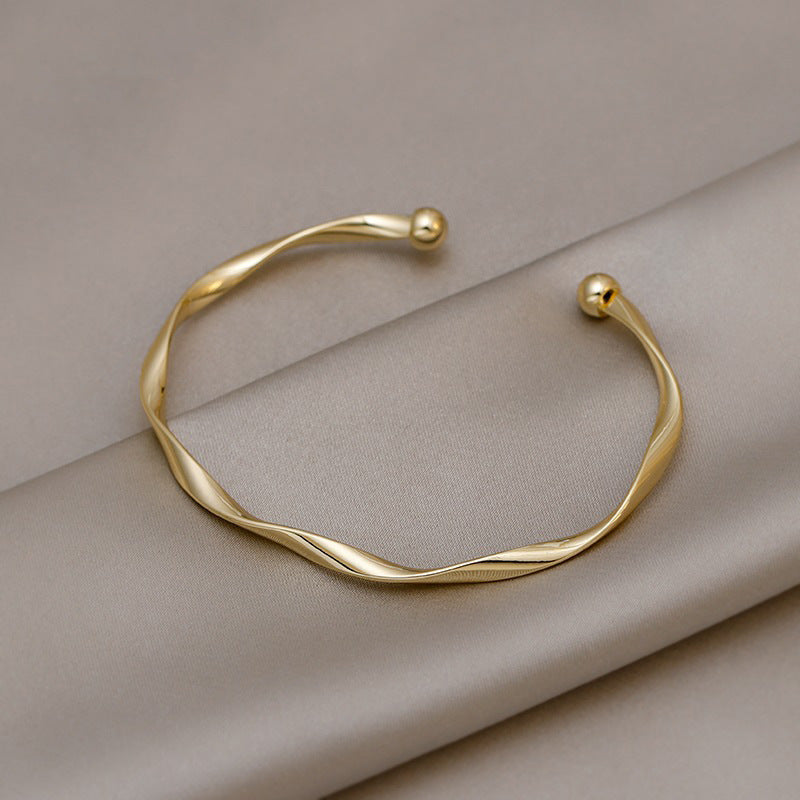 Golden Twist Cuff Bracelet