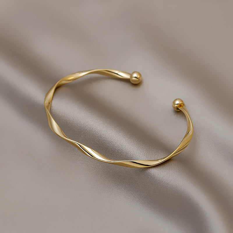 Golden Twist Cuff Bracelet