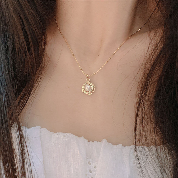 Golden Pearl Keepsake Necklace