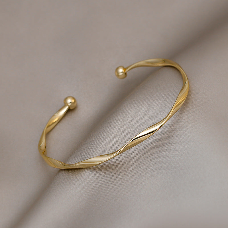Golden Twist Cuff Bracelet
