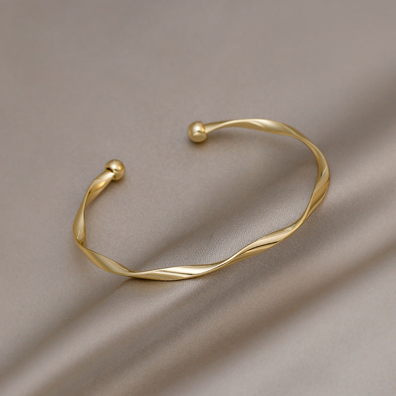 Golden Twist Cuff Bracelet
