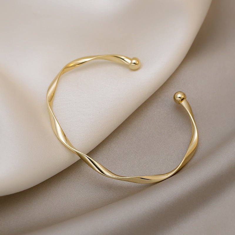 Golden Twist Cuff Bracelet
